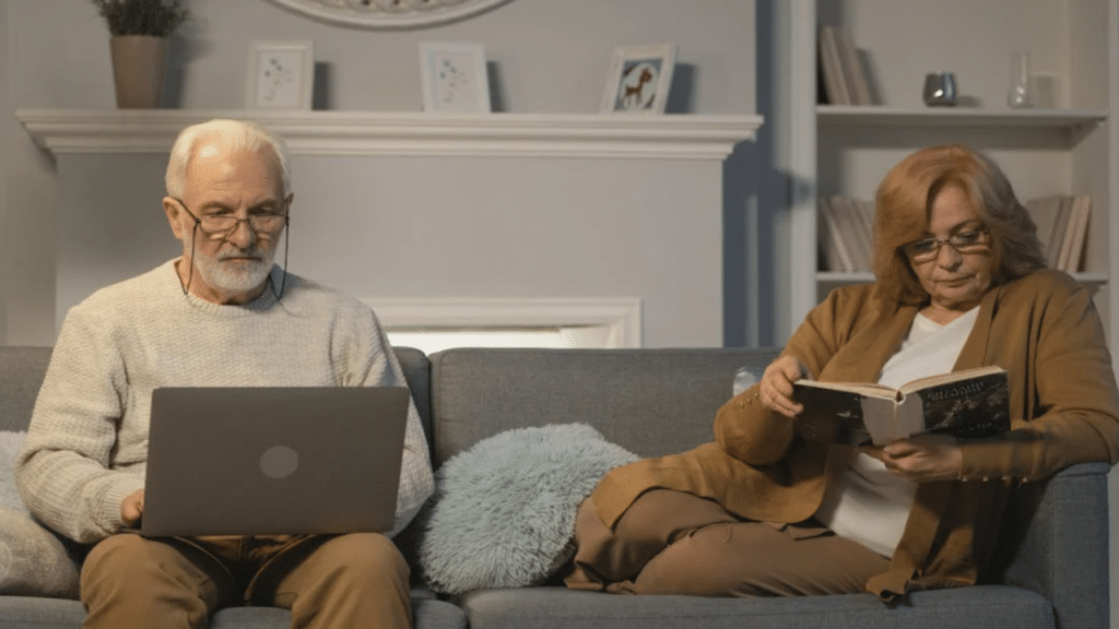 A couple ignoring each other at home