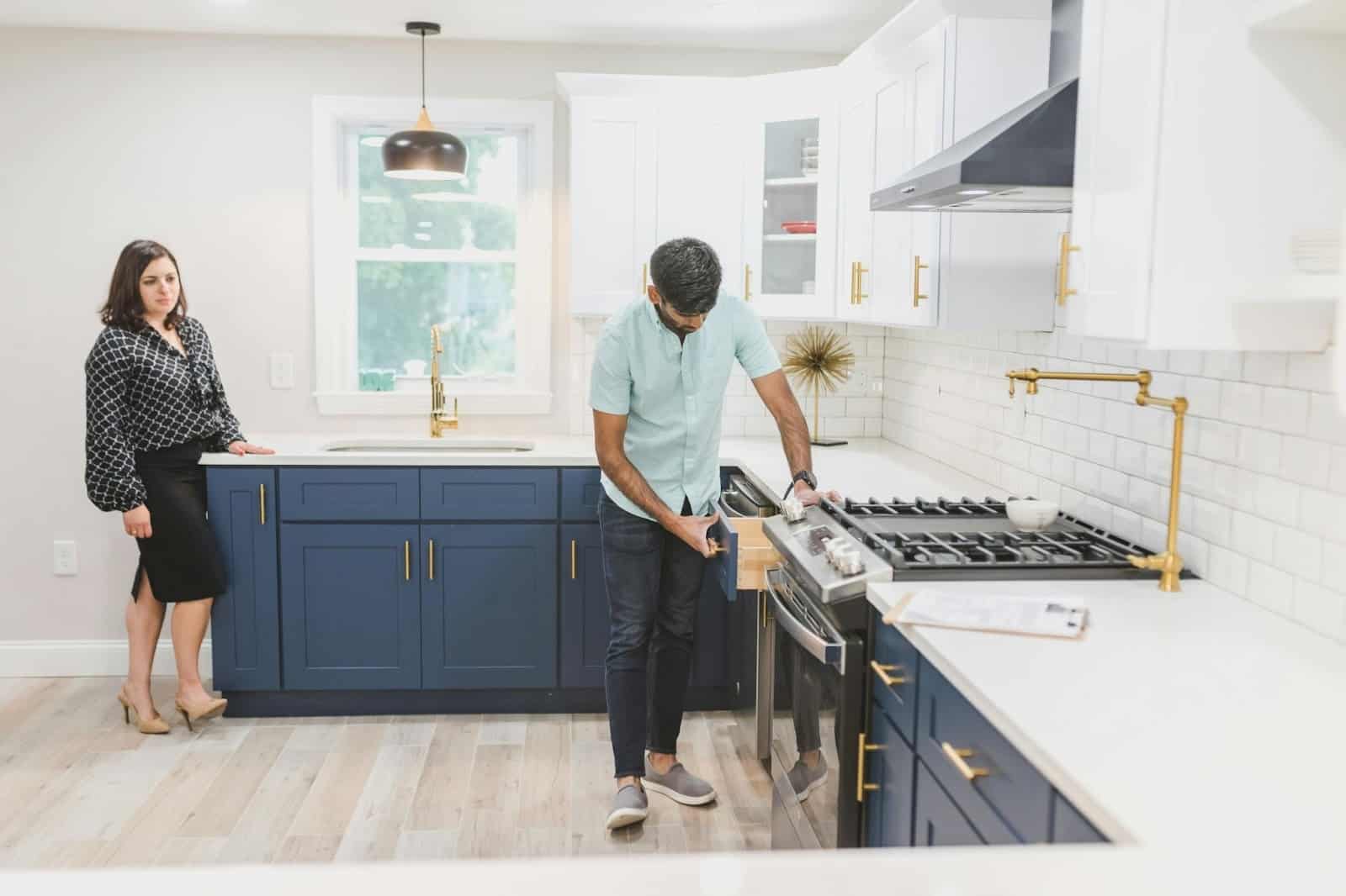 A man and woman at the kitchen