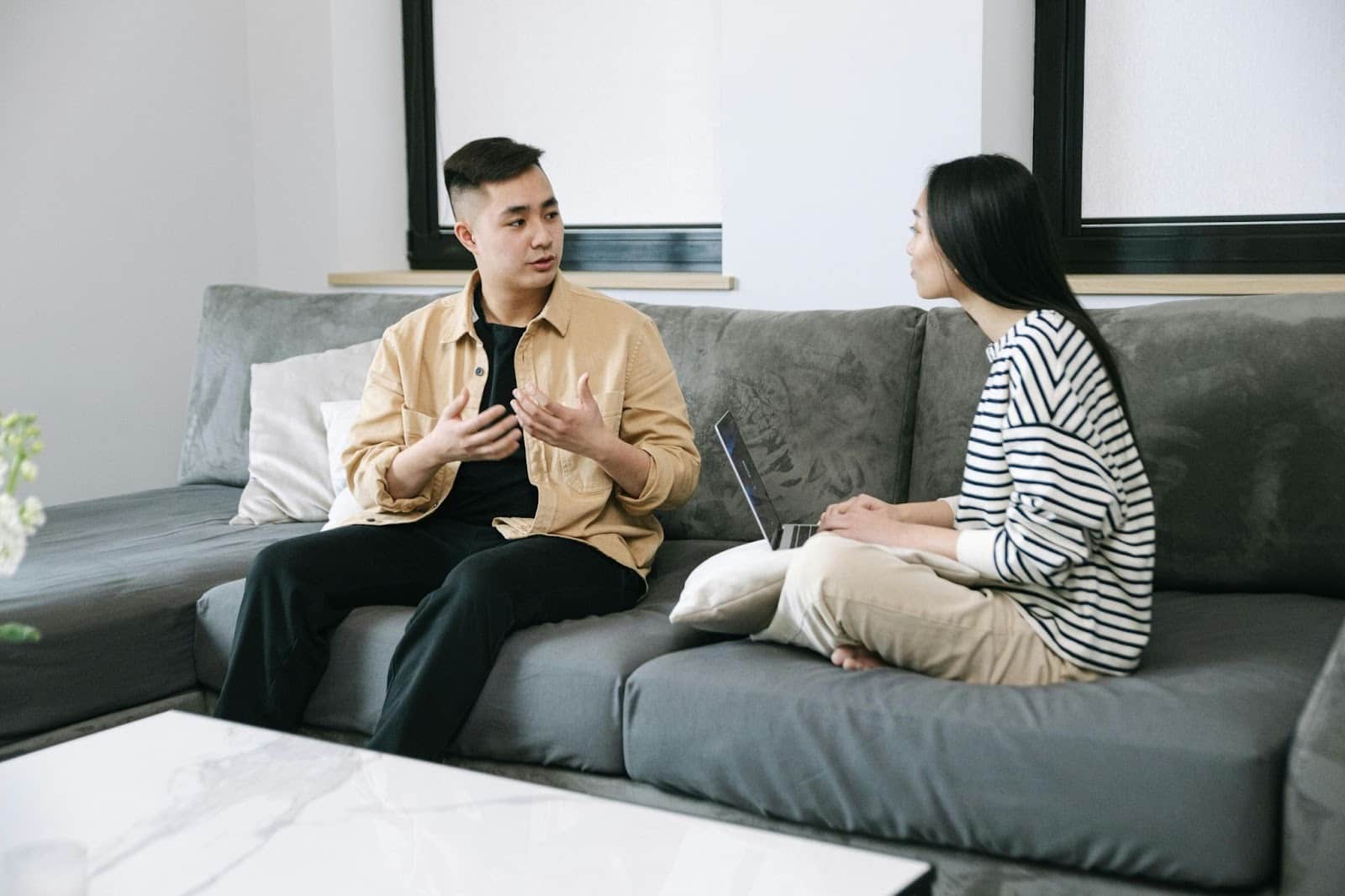 A man and woman talking