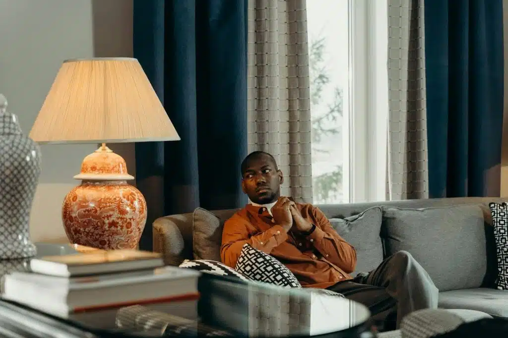 A man at the sofa alone