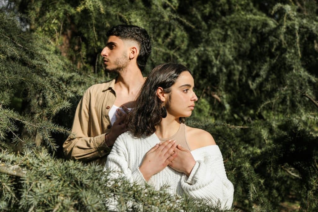 A man and woman looking on the other way