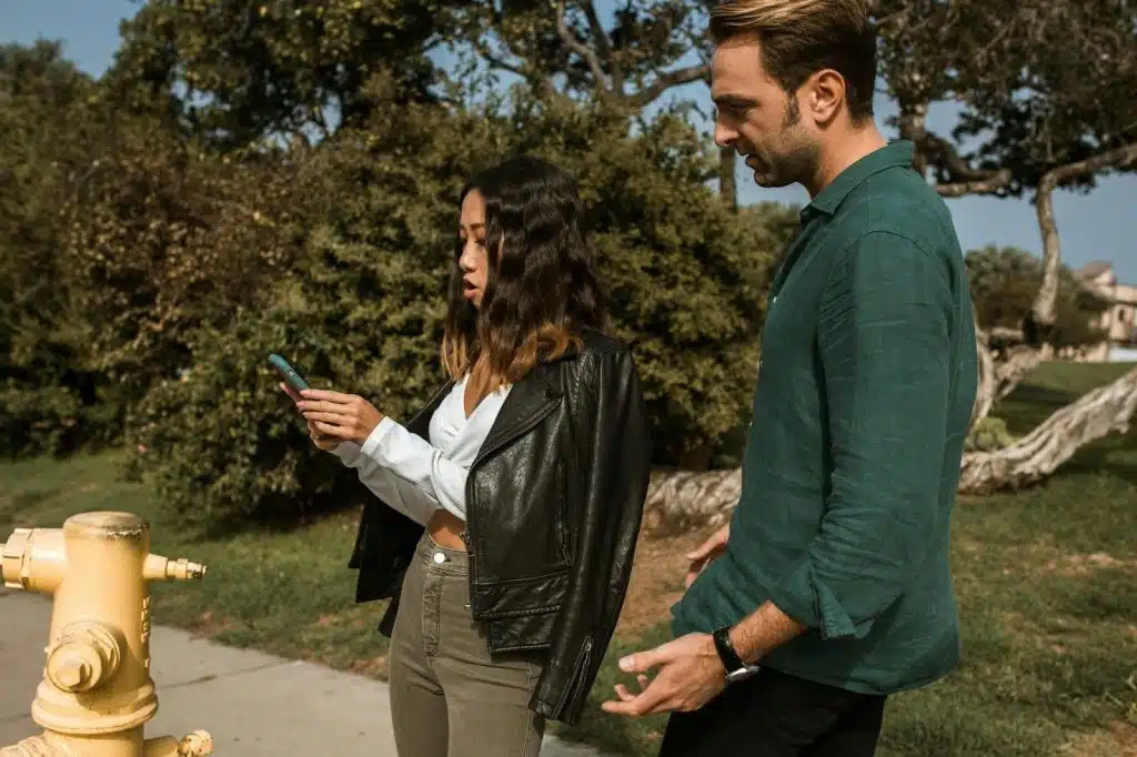 Woman showing proof to a man