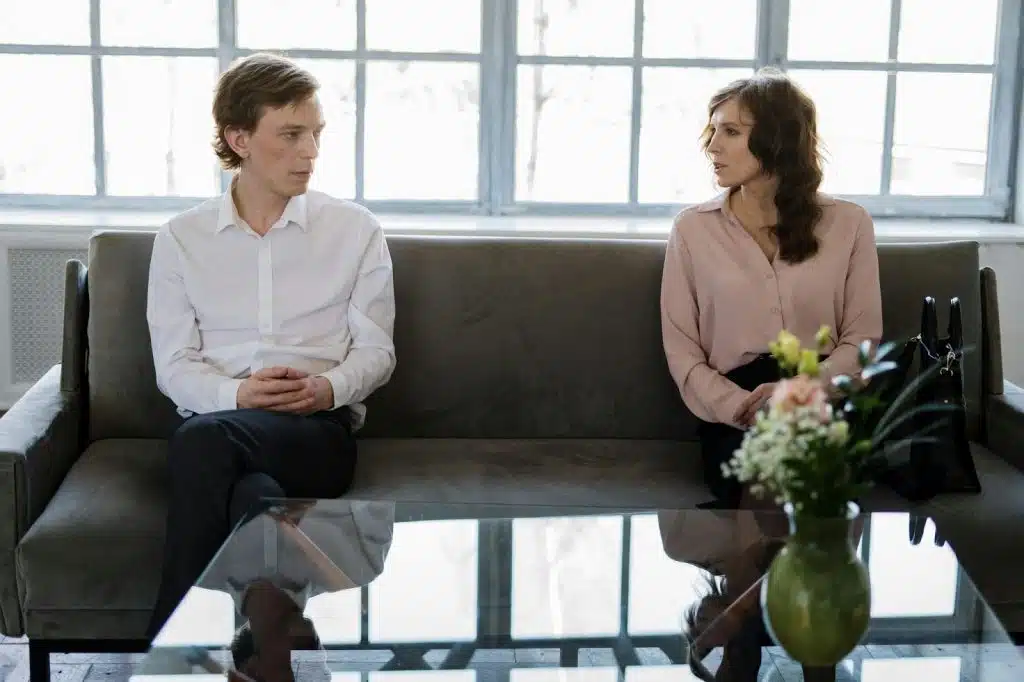 A man and woman looking at each other