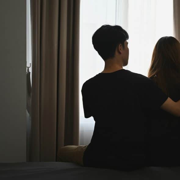 couple distant indoors