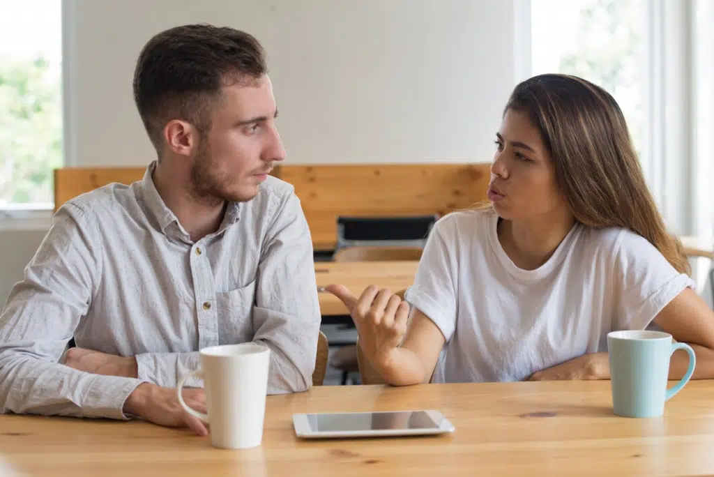 Serious young people chatting