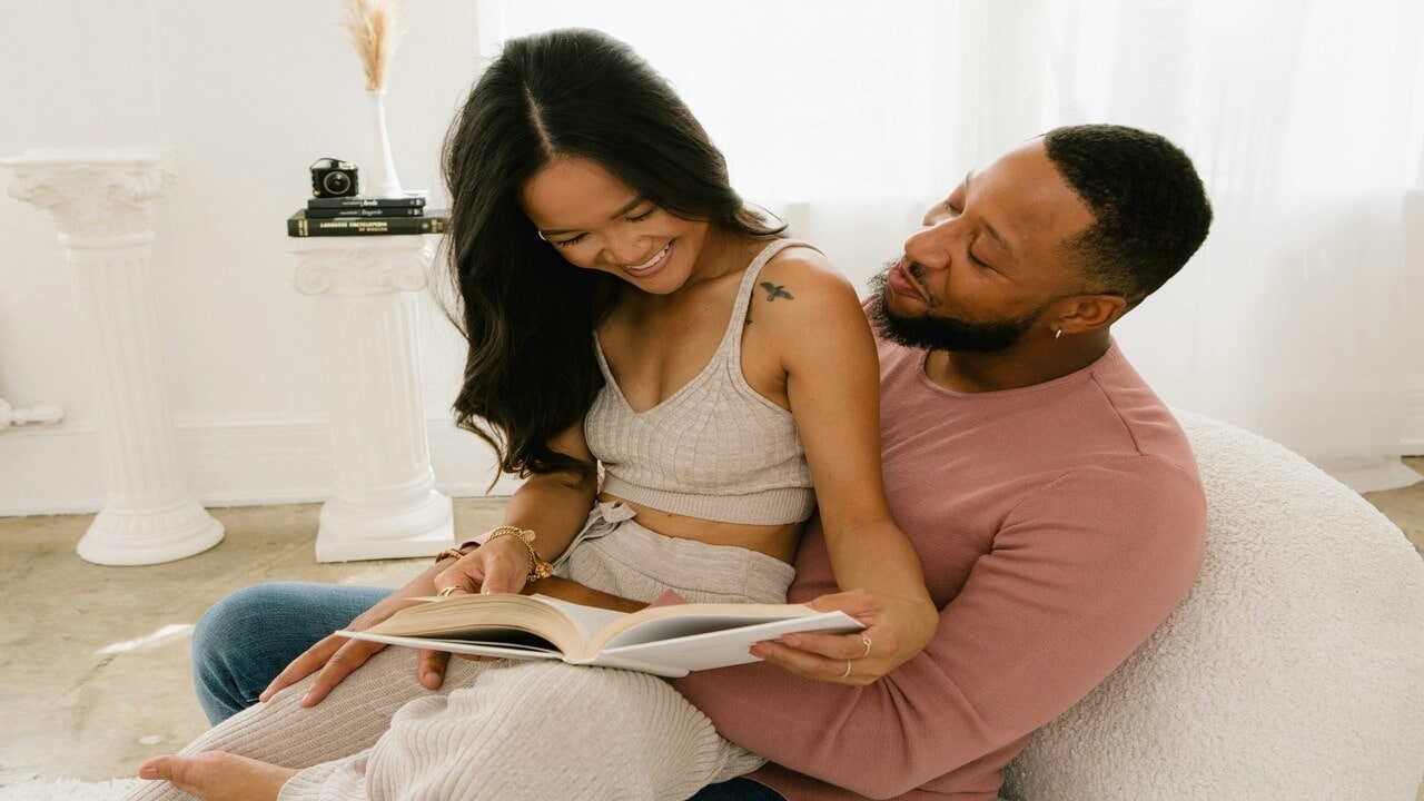 A couple cuddling at home