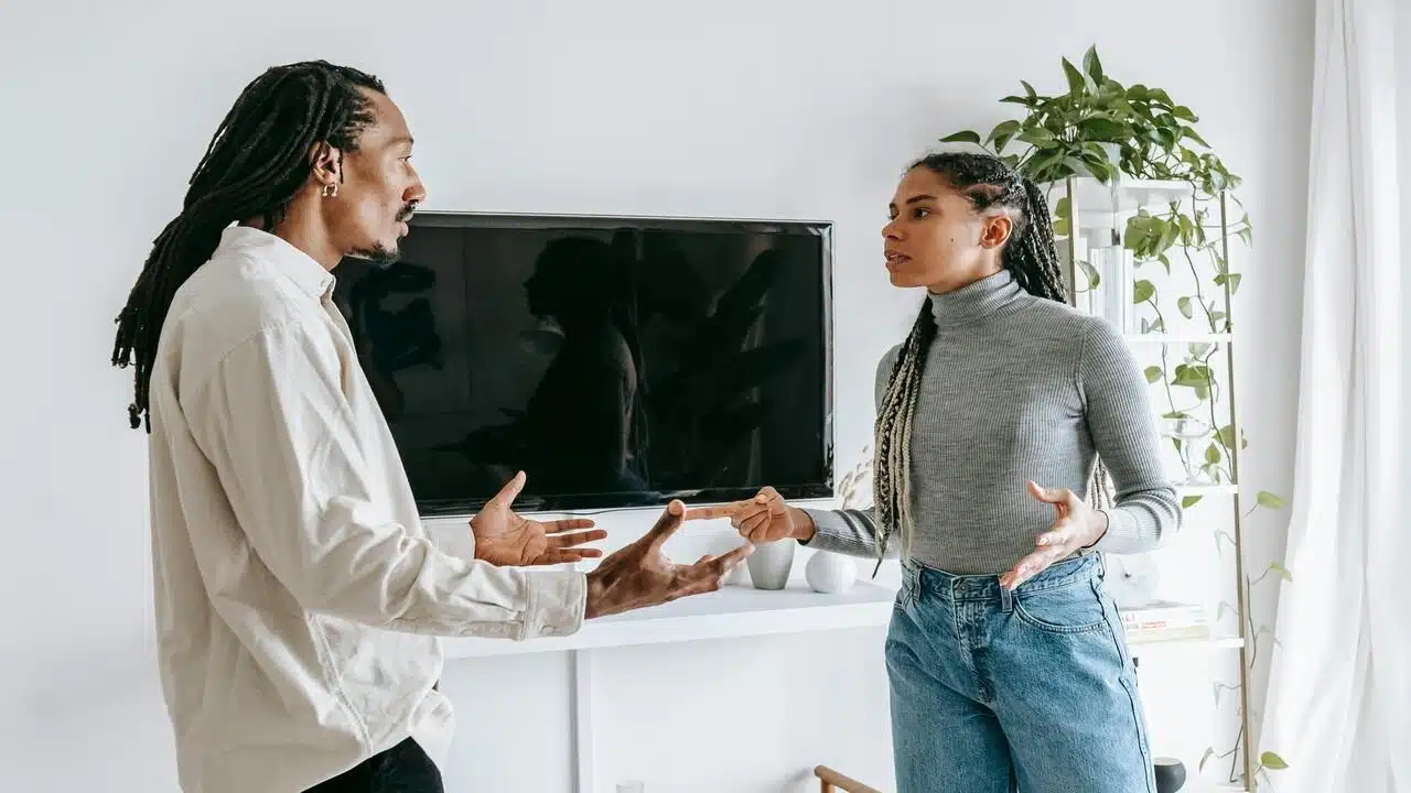 A couple having a serious talk at home