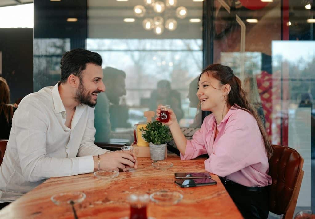 couple smiling conversation