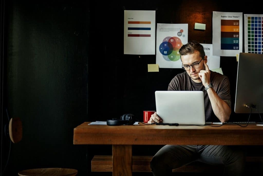 man working late office