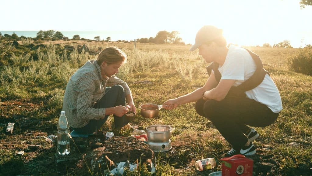 man with friends outdoors