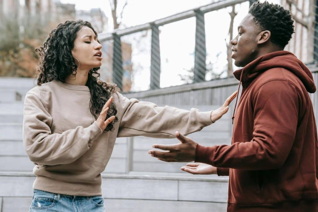 A man and woman arguing