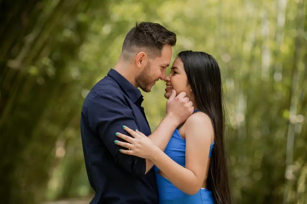 A man and woman facing each other