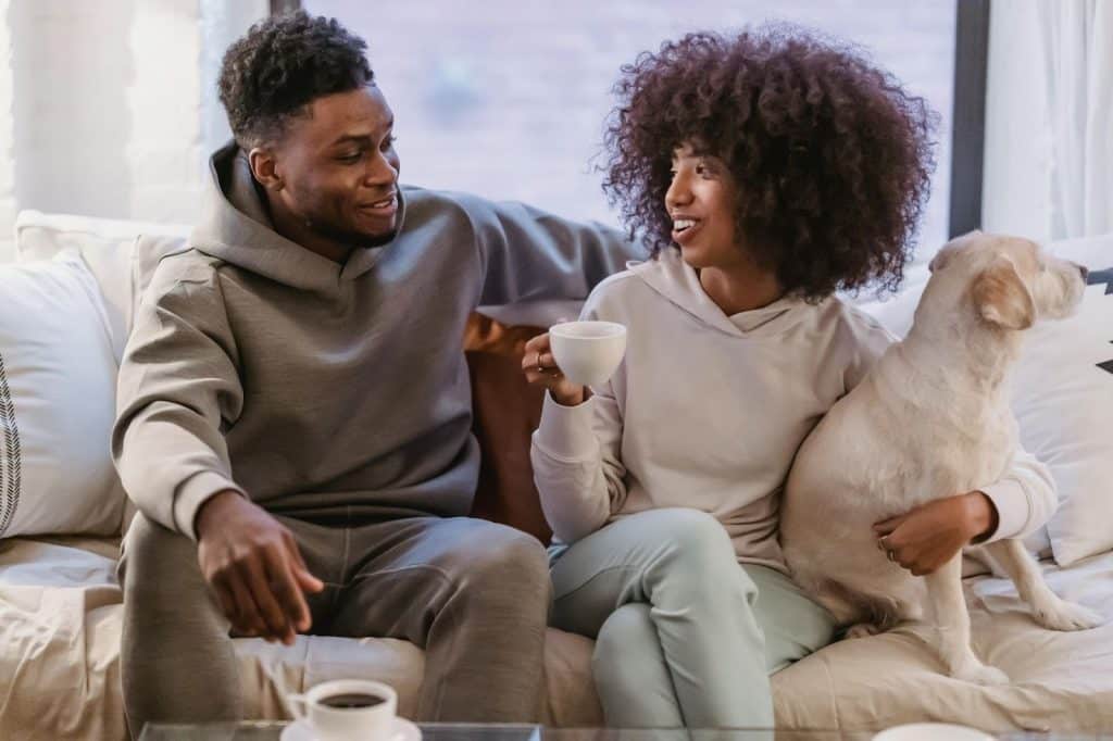 A man and woman at the sofa