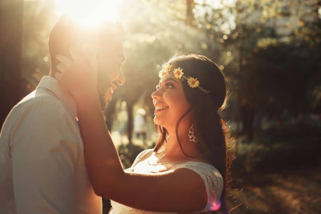 A man and woman facing each other