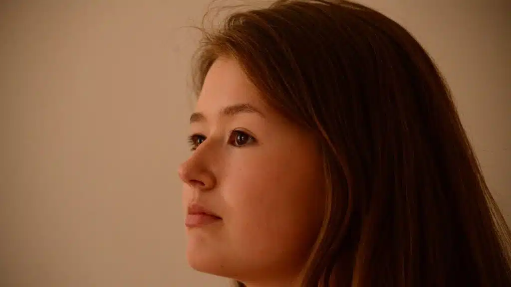 A woman looking serious.