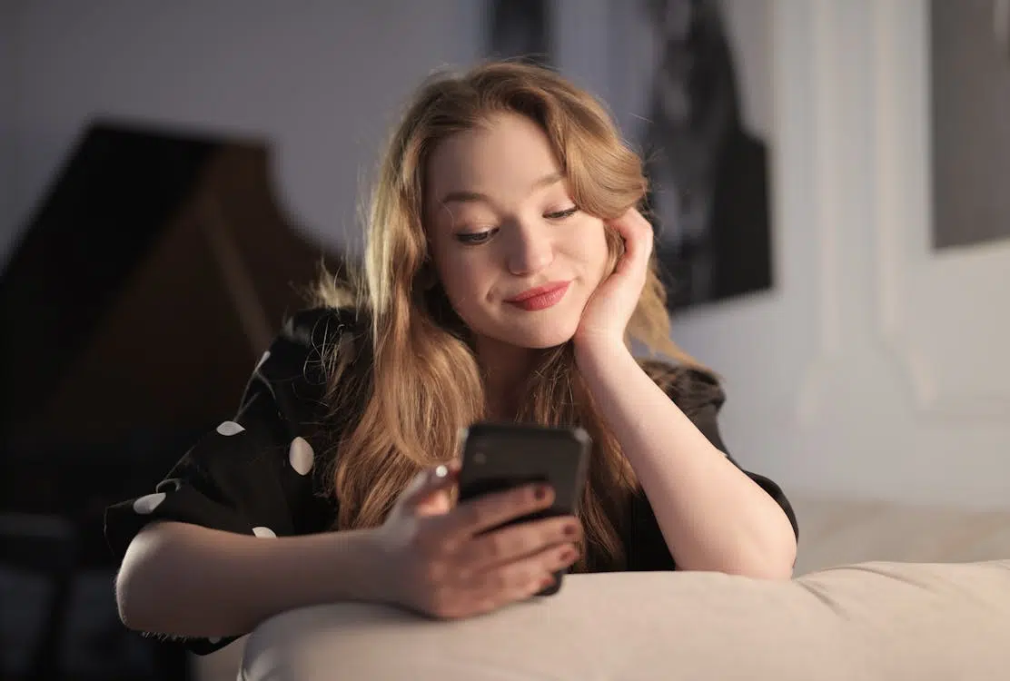 A woman smiling