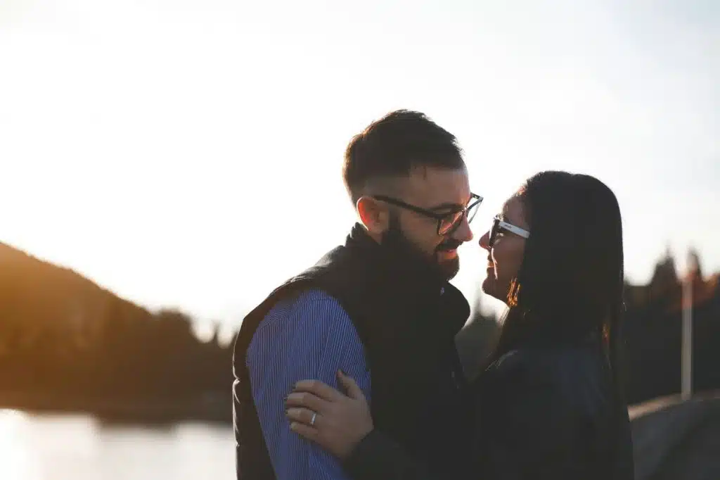 A man and woman looking at each other