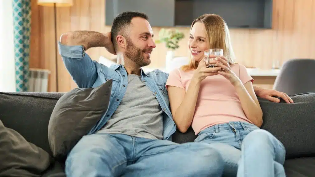 A man and woman looking at each other