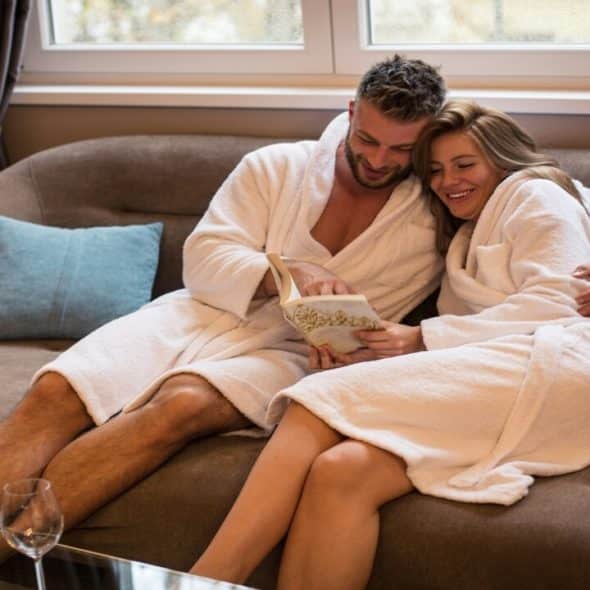A couple reading a book together