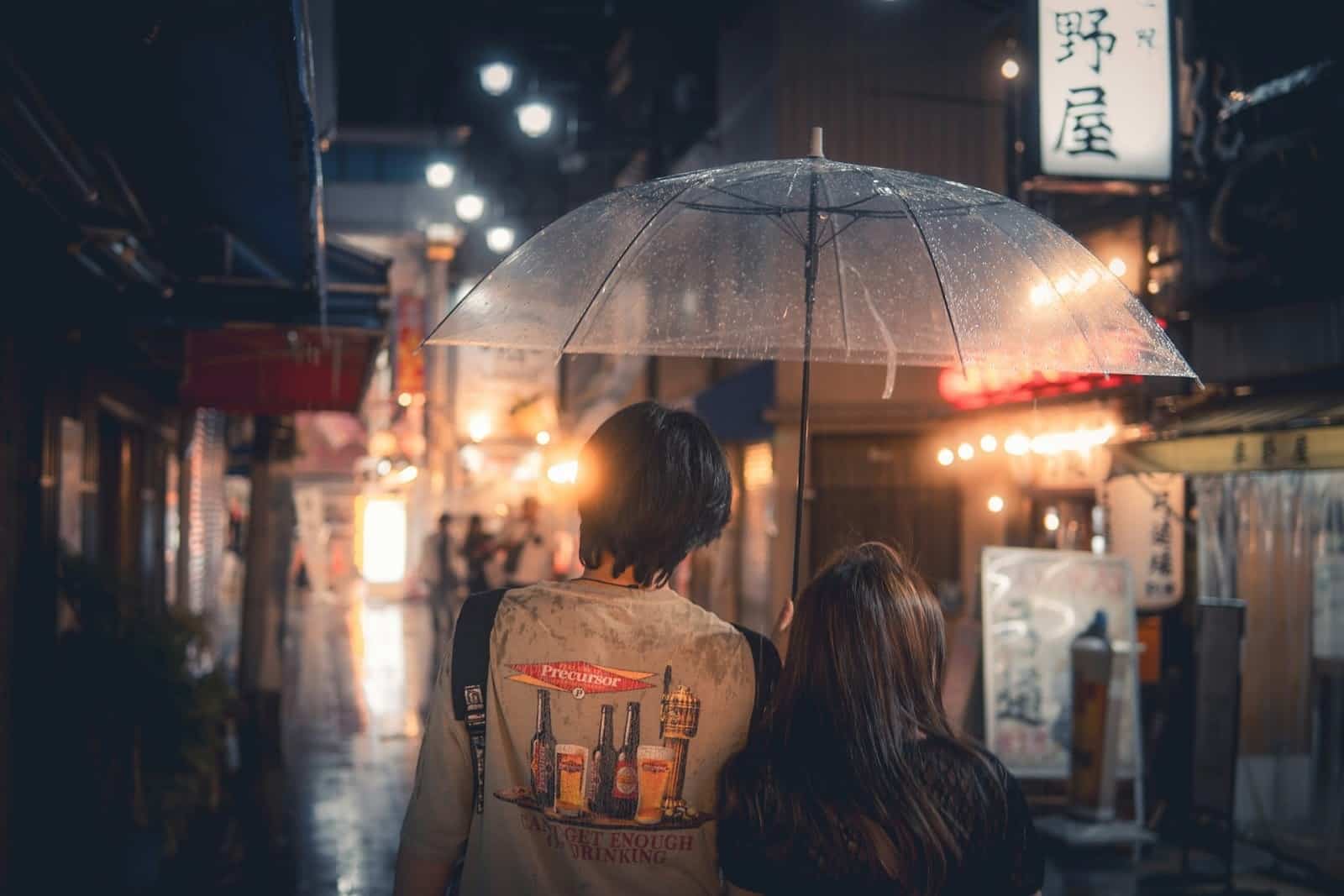 couple rainy day walk