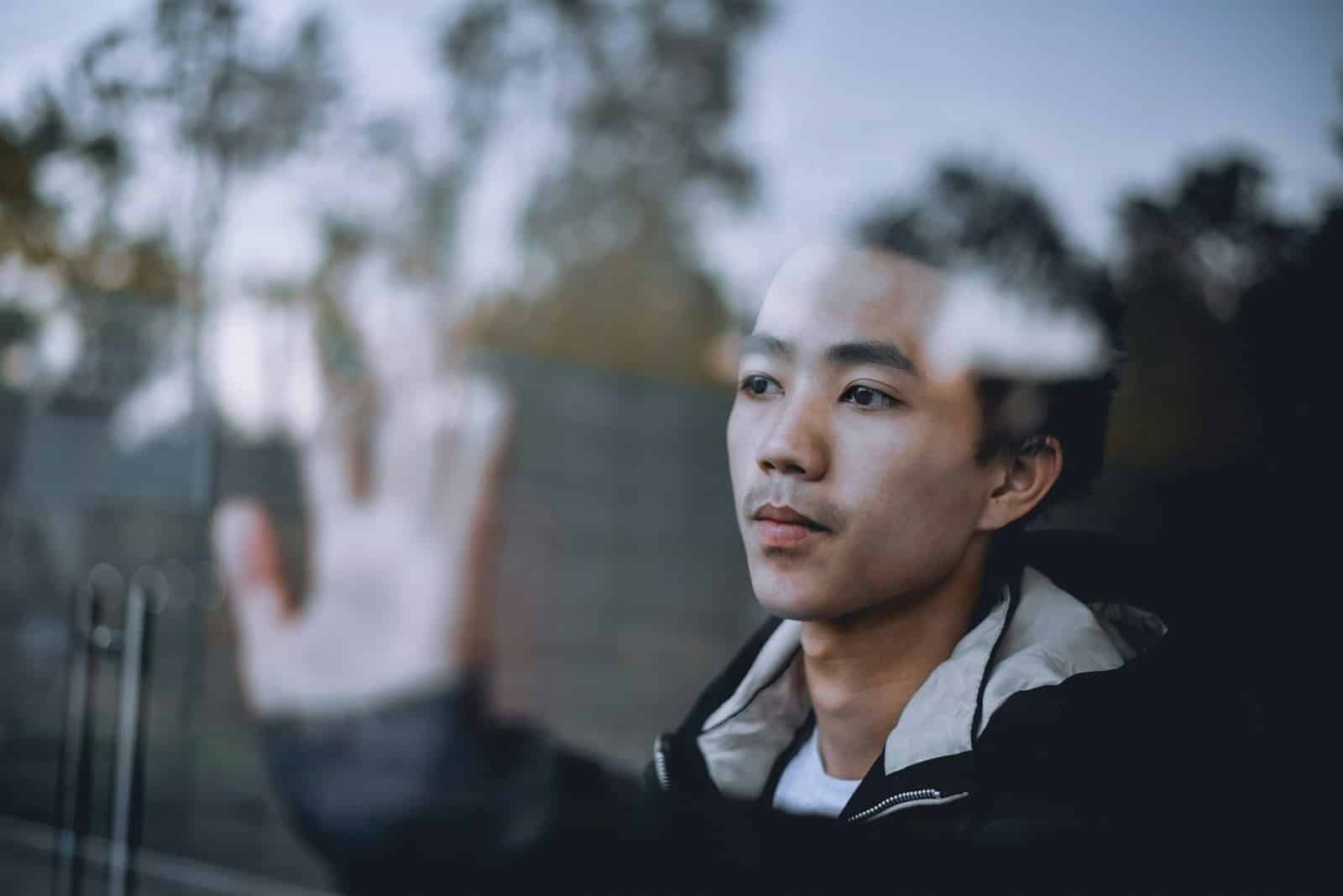 man reflective window