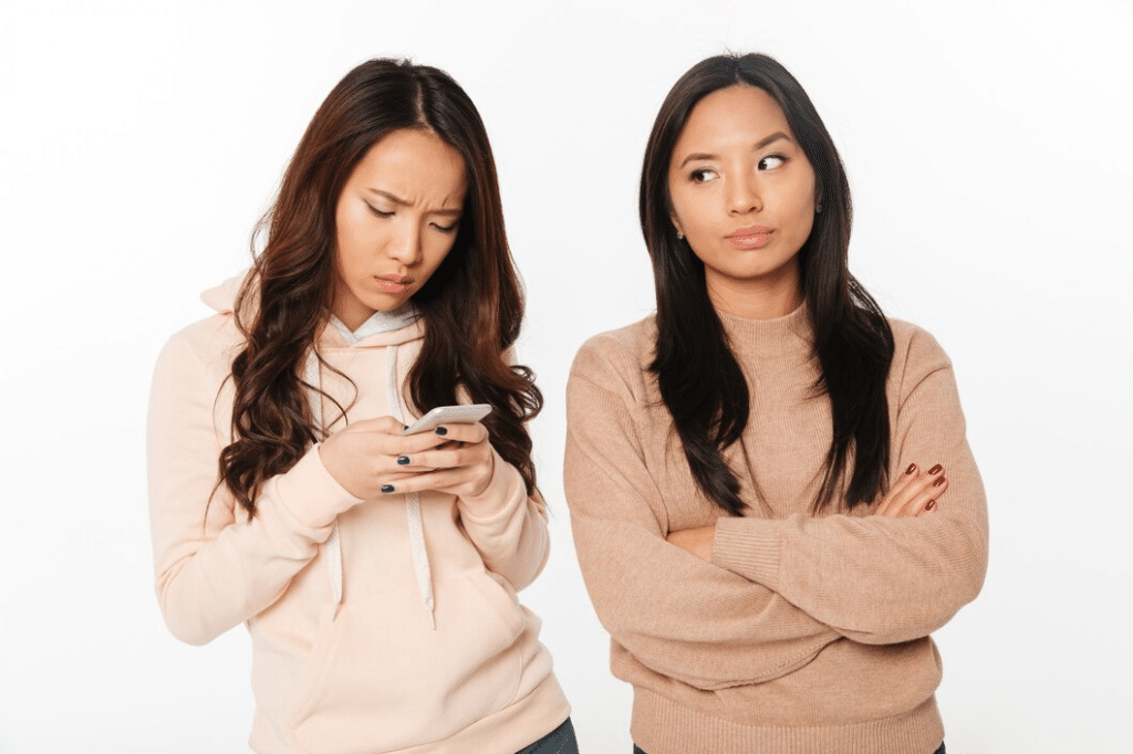 Girl displeased because of her sister