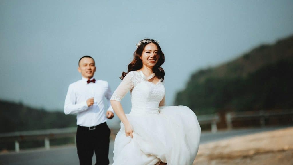 A groom chasing a bride.