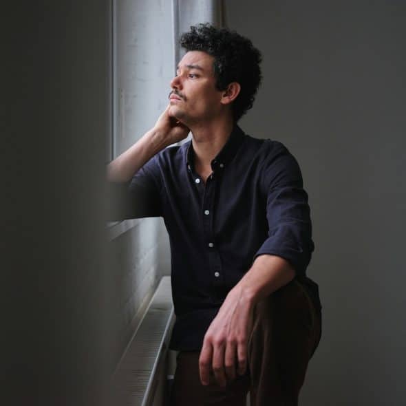 thoughtful man indoors
