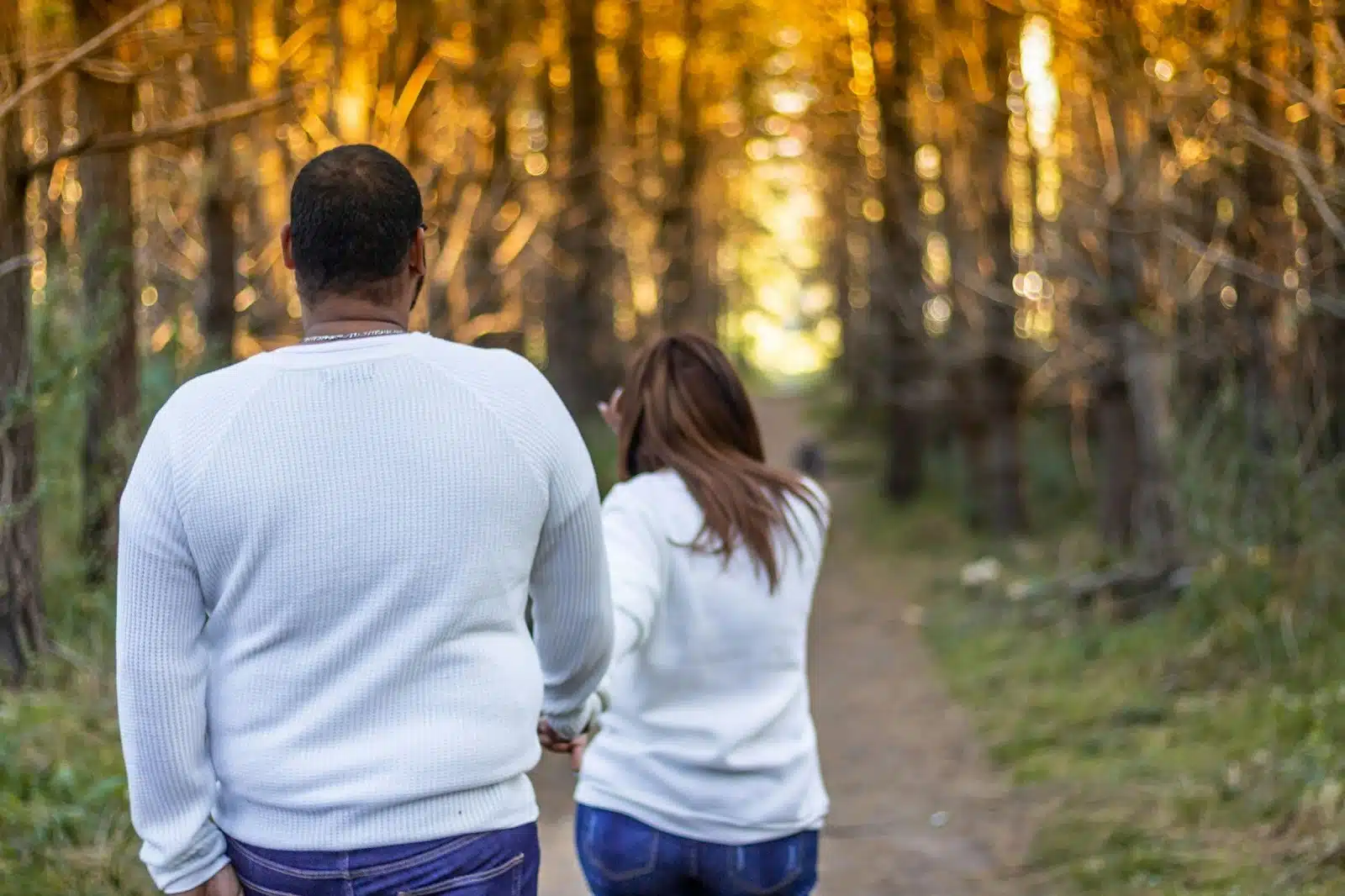 A man following a woman