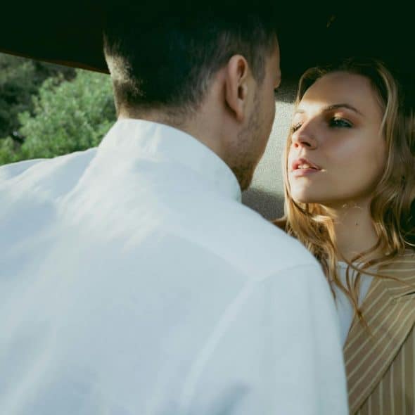 Man and woman facing each other