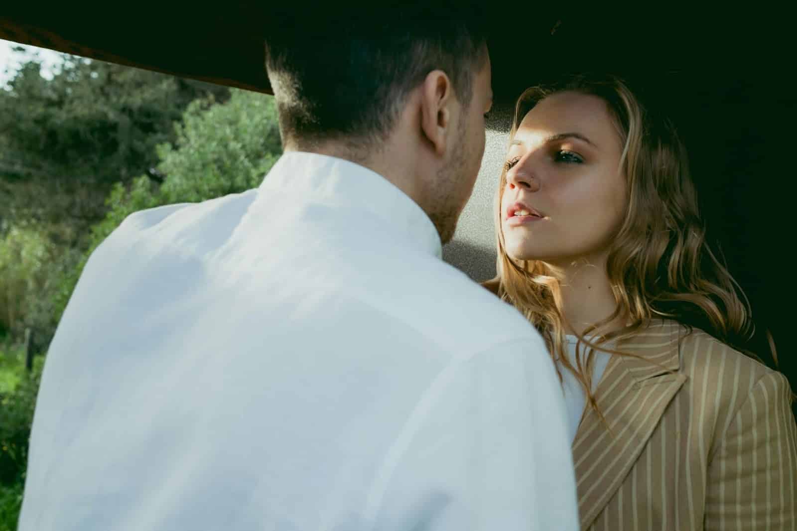 Man and woman facing each other