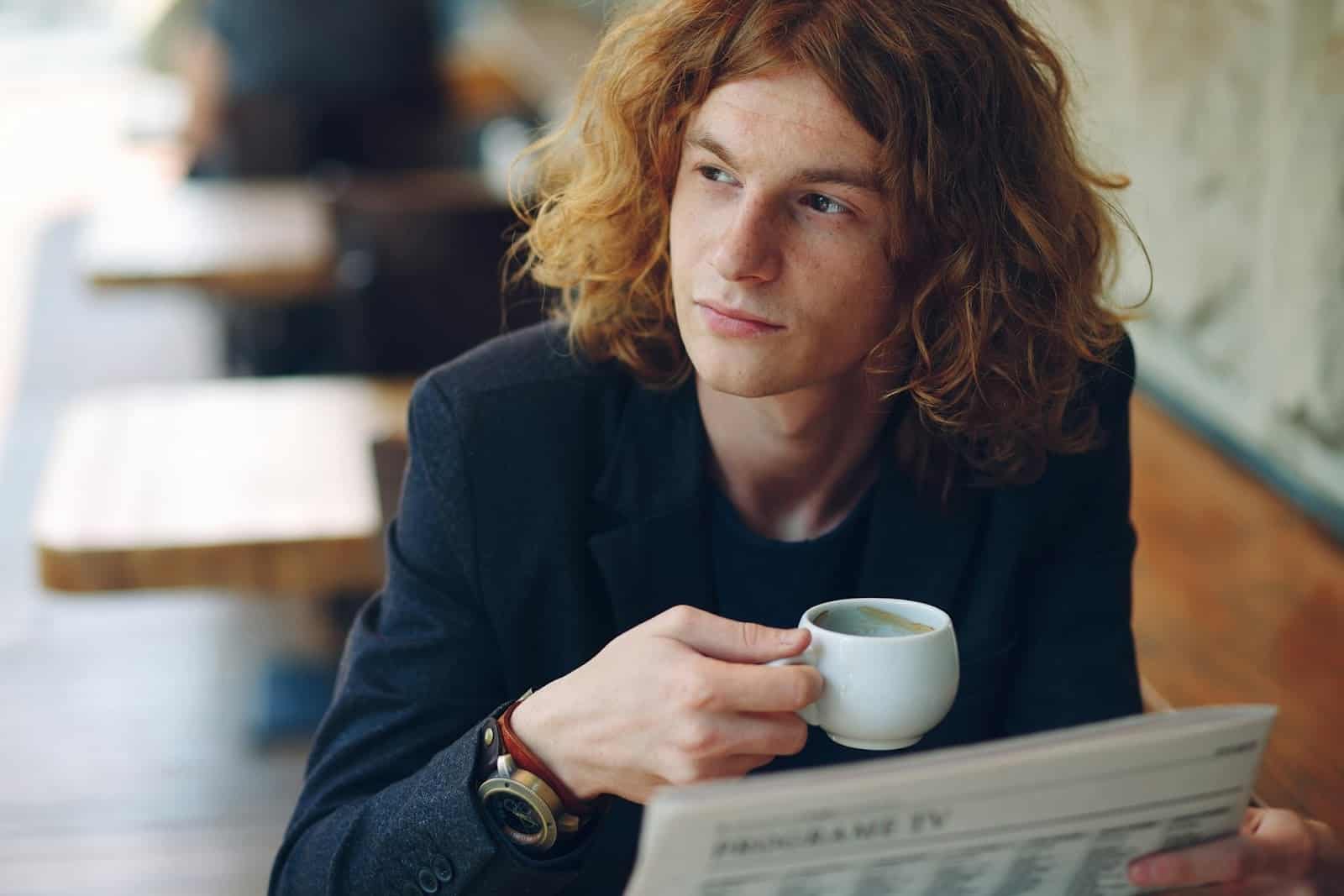 man looking away indoors