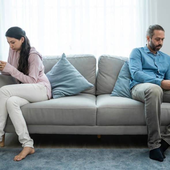 couple sitting apart