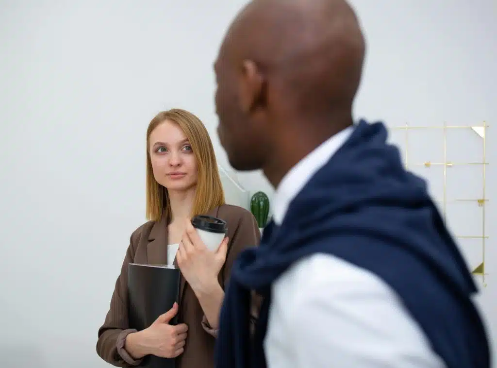 A man and a woman looking at each other