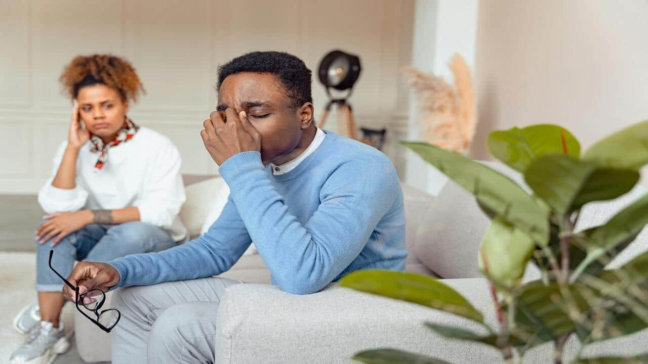 A man refusing to look at his wife