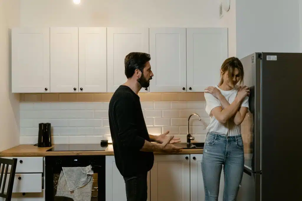 A man confronting a woman