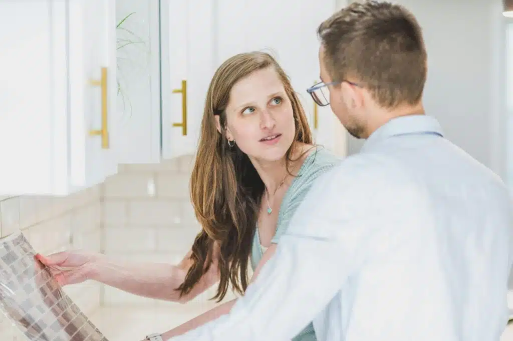 A man and woman looking at each other