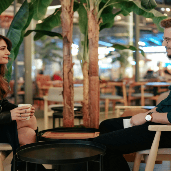 A man and a woman are talking