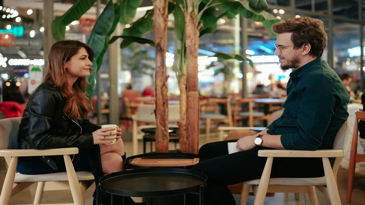 A man and a woman are talking