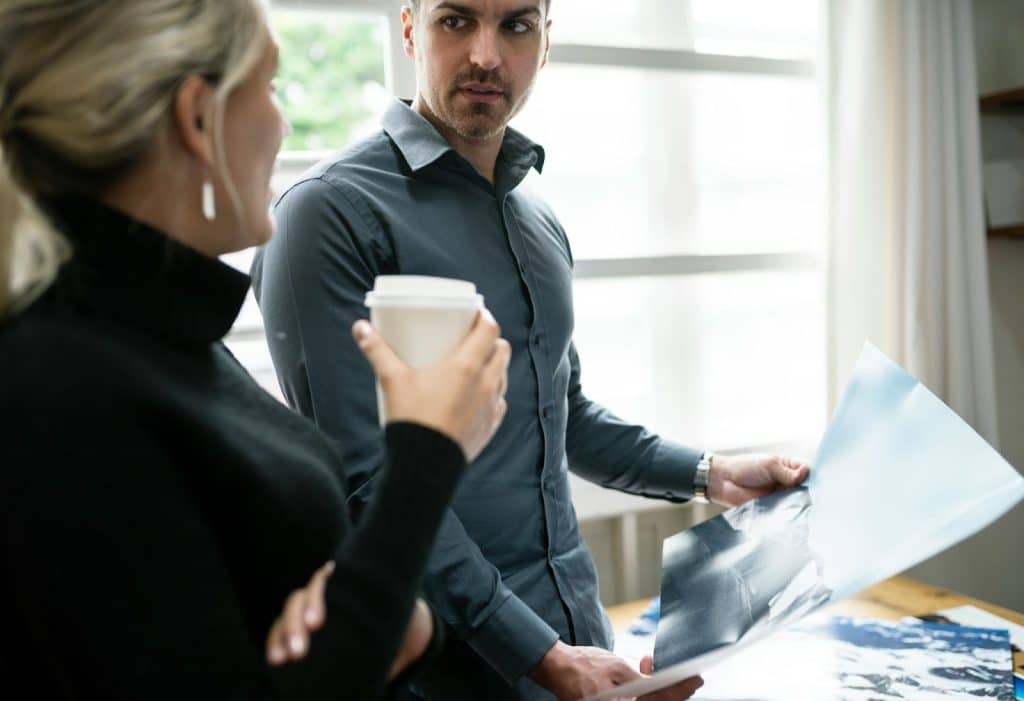 Woman helping a man