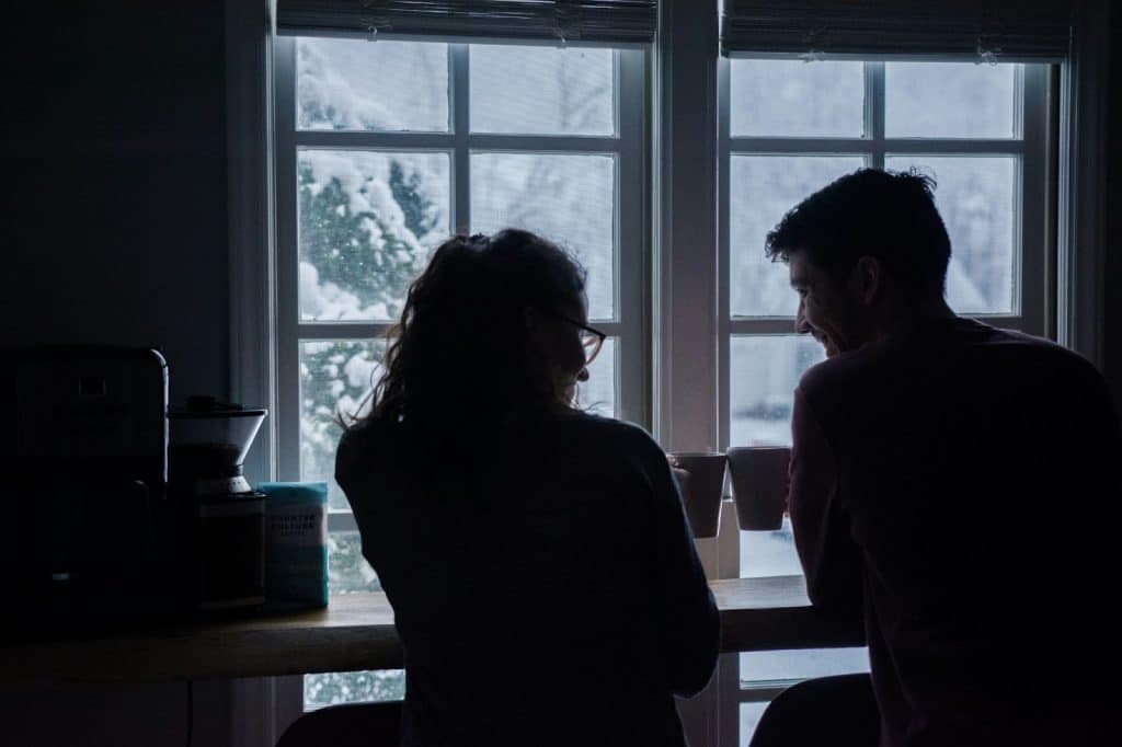 A man and woman having a coffee