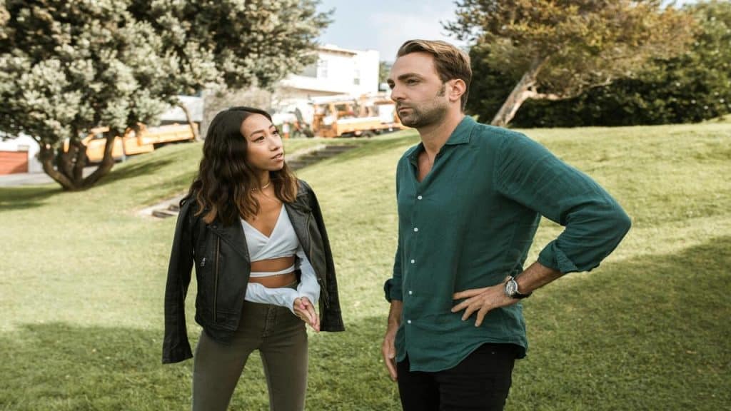 A couple arguing outdoors