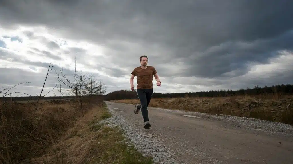 A man jogging on a field
