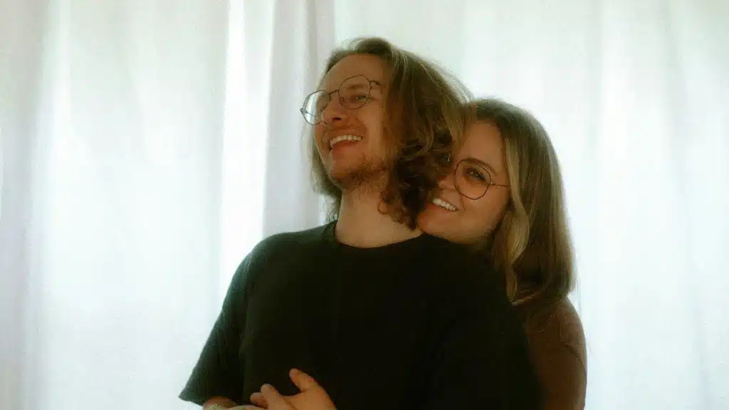 Woman hugging a man