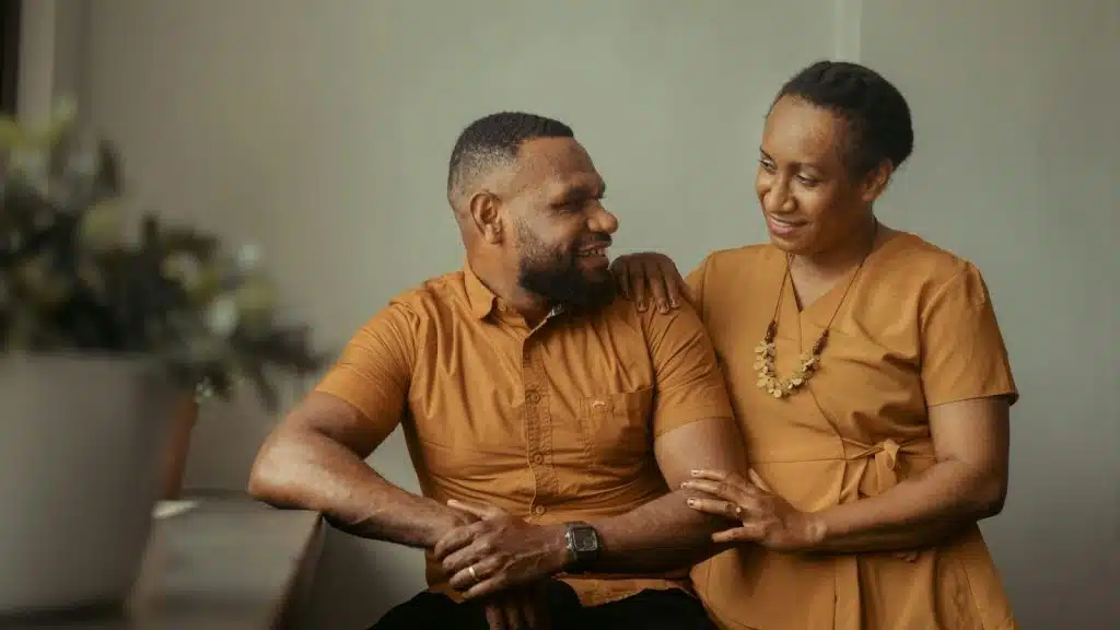 A man and woman looking at each other