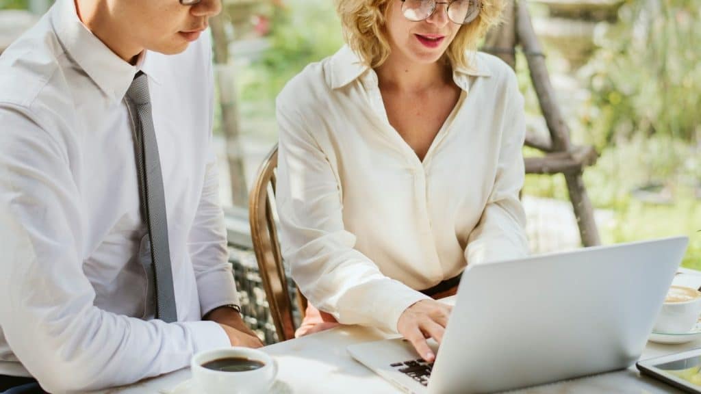 A man and woman checking their finances