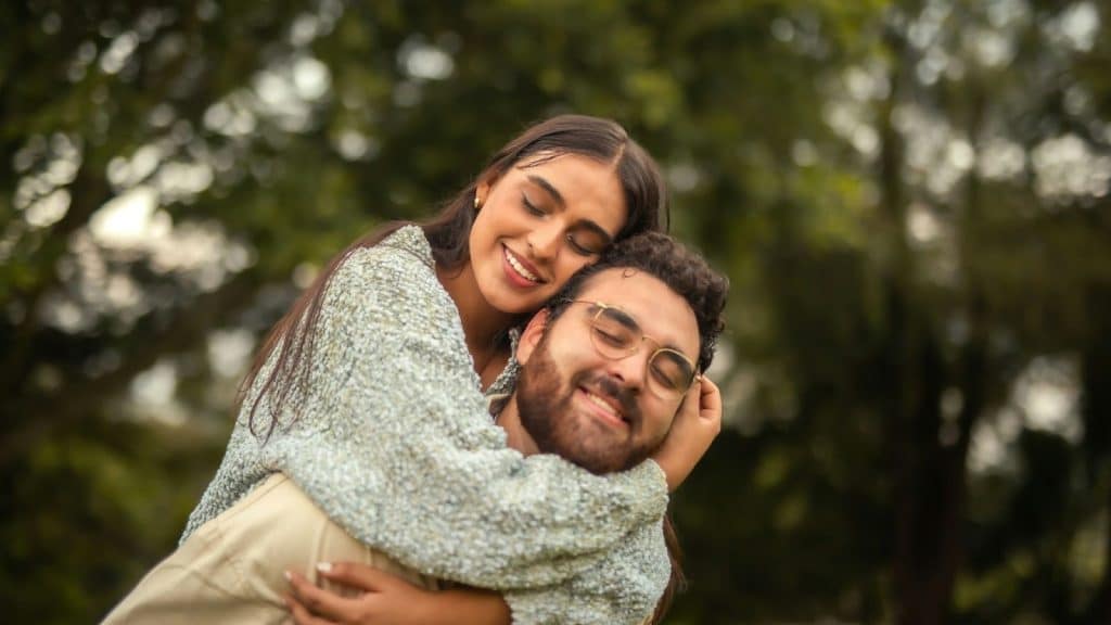 Woman hugging a man