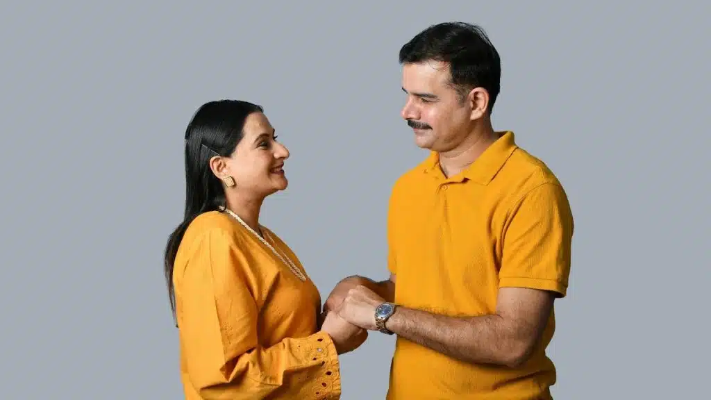 A man and woman holding hands