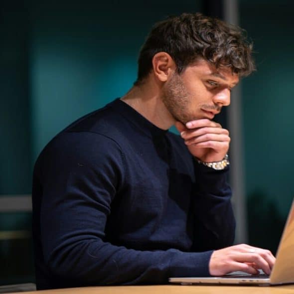A man thinking at work