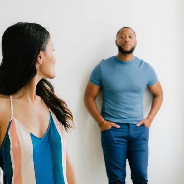 A man and woman looking at each other